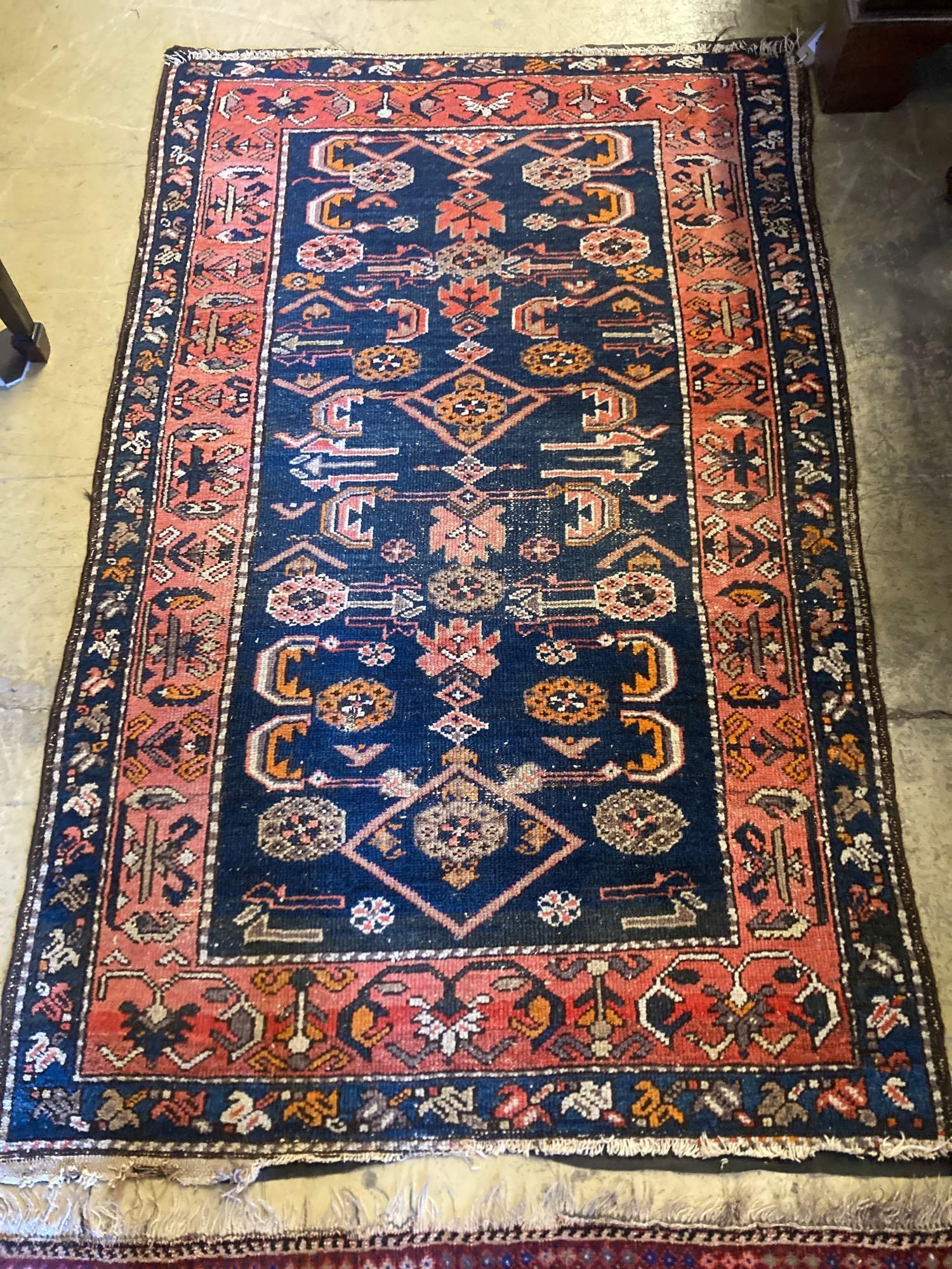 A Belouch blue ground rug, 172 x 110cm